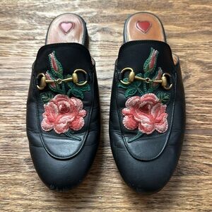 Well loved Gucci black slides